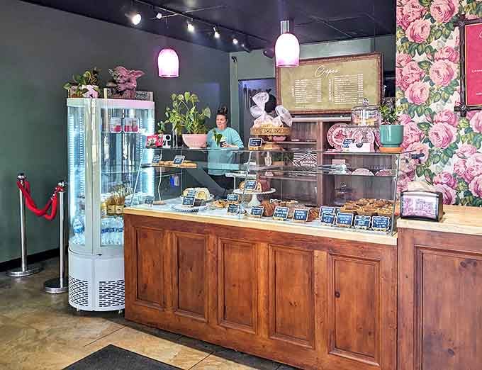 The pastry counter and floral interior at That French Place