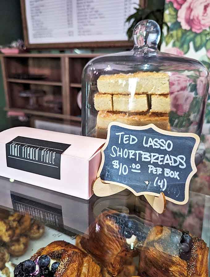 Boxes and a display of That French Place Ted Lasso-inspired shortbread biscuits